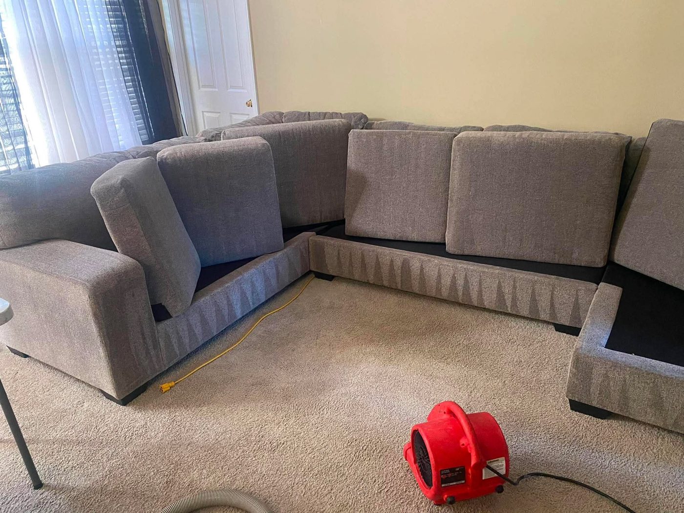 Grey sectional upholstery cleaning with air mover for fast drying in the East Bay